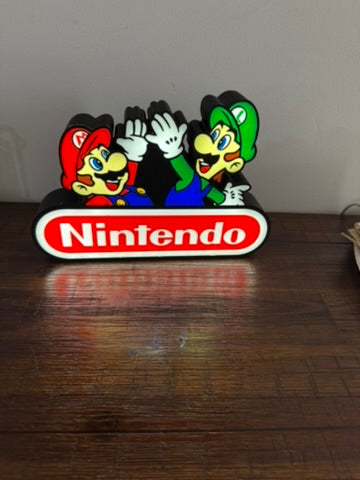 Nintendo Mario & Luigi High-Five Display Sign - Level Up Your Desk Setup! 🎮