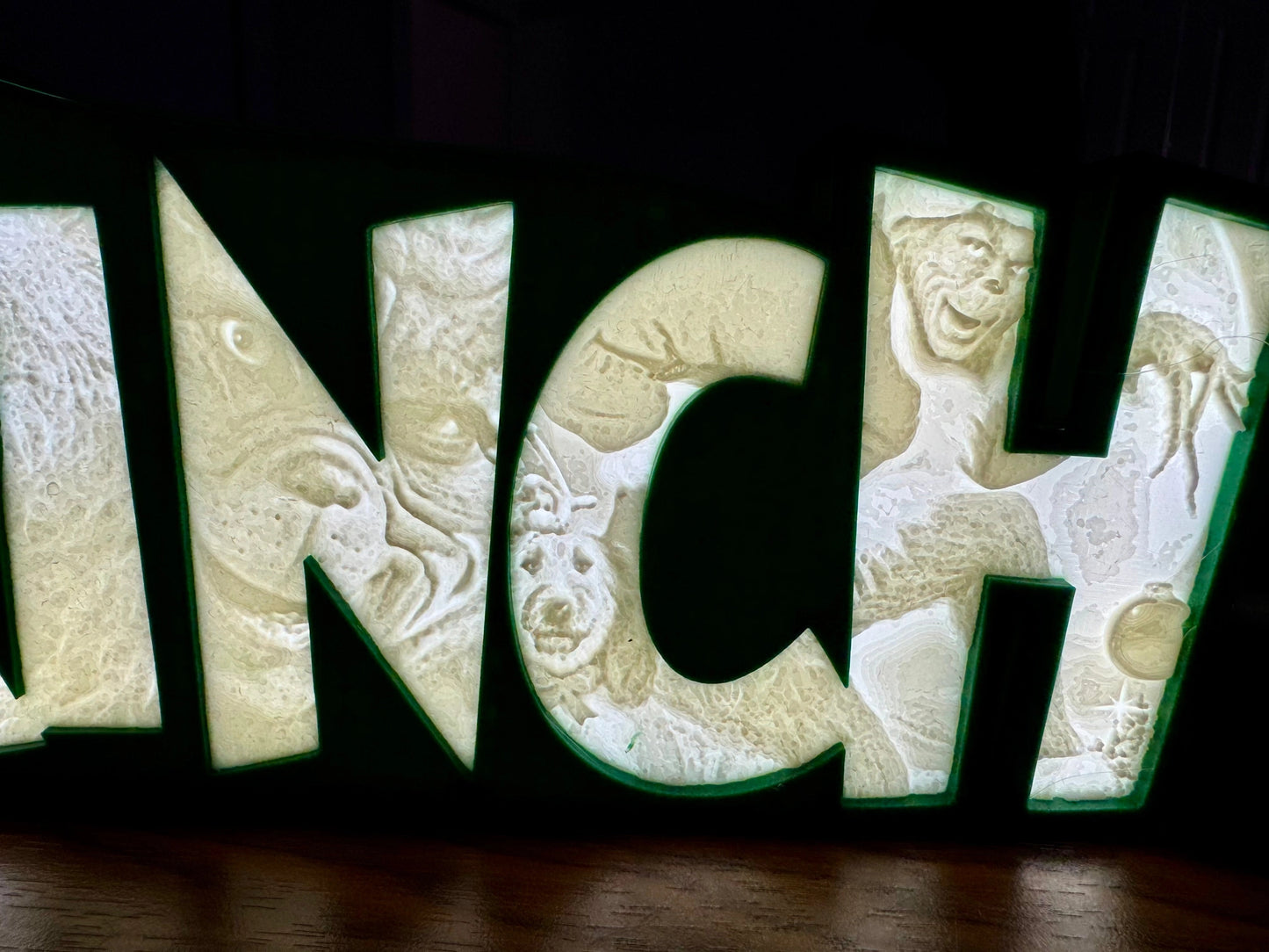 “The Grinch” - Light up Sign/Decoration - with very detailed grinch imagery in the letters! - Michael's 3D World