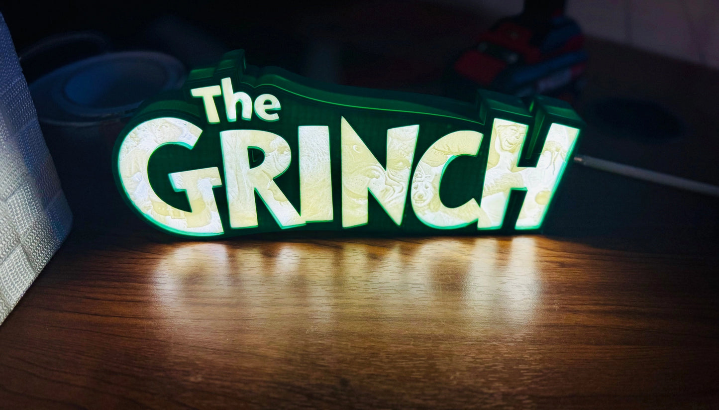 “The Grinch” - Light up Sign/Decoration - with very detailed grinch imagery in the letters! - Michael's 3D World