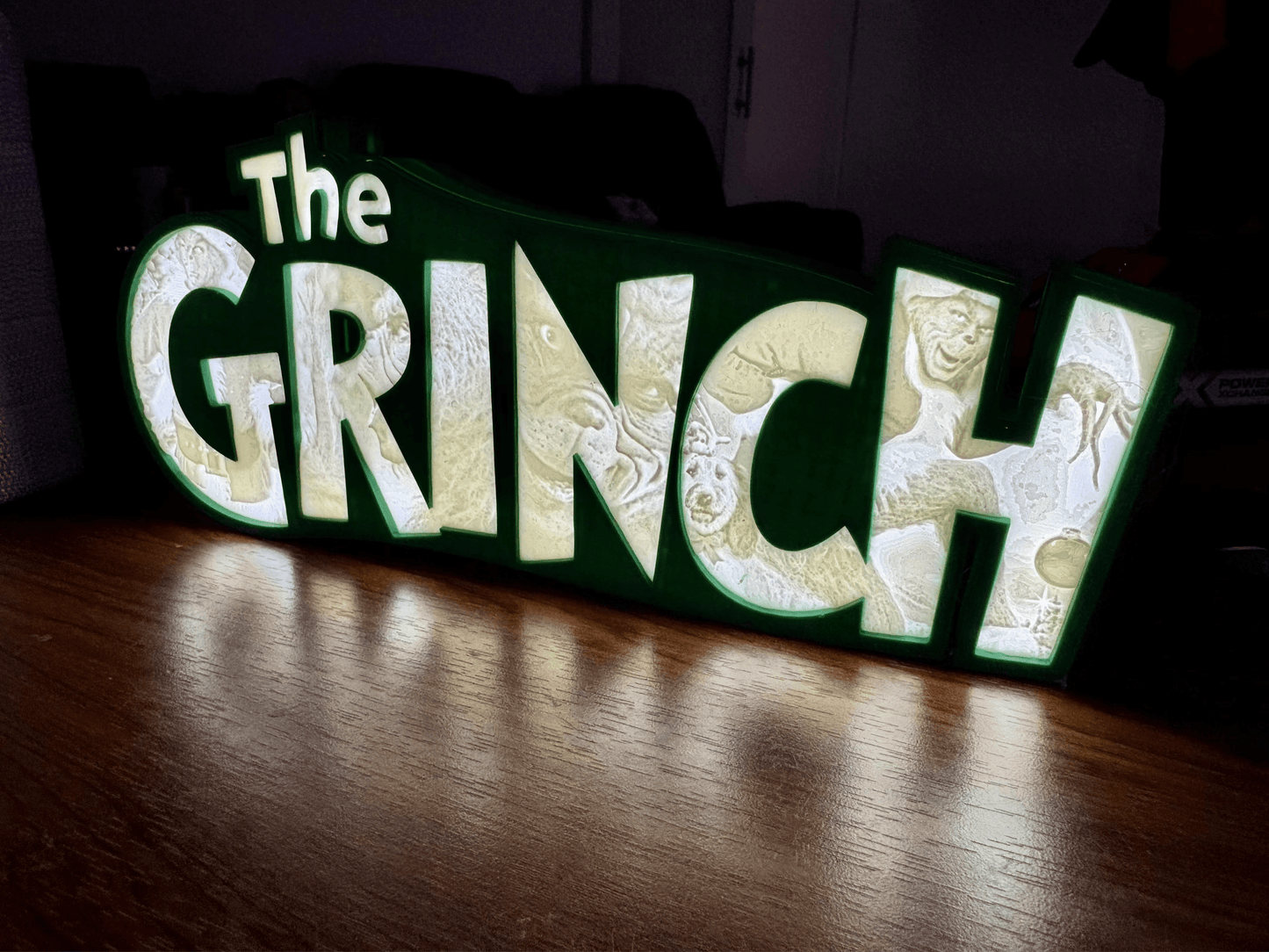 “The Grinch” - Light up Sign/Decoration - with very detailed grinch imagery in the letters! - Michael's 3D World