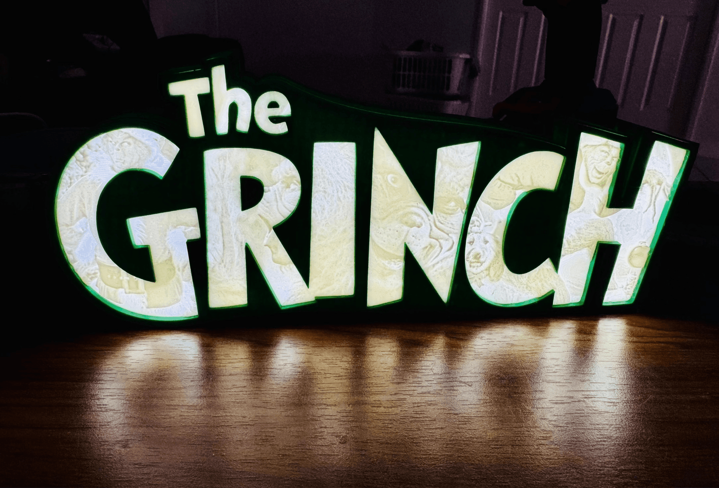 “The Grinch” - Light up Sign/Decoration - with very detailed grinch imagery in the letters! - Michael's 3D World