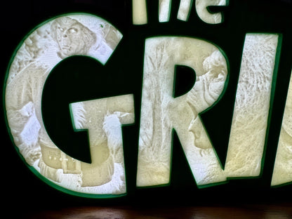 “The Grinch” - Light up Sign/Decoration - with very detailed grinch imagery in the letters! - Michael's 3D World