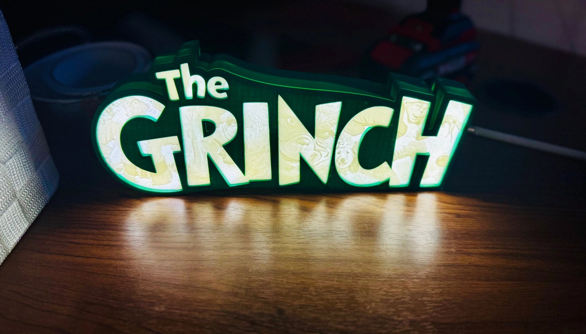 “The Grinch” - Light up Sign/Decoration - with very detailed grinch imagery in the letters! - Michael's 3D World