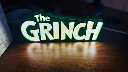 “The Grinch” - Light up Sign/Decoration - with very detailed grinch imagery in the letters! - Michael's 3D World